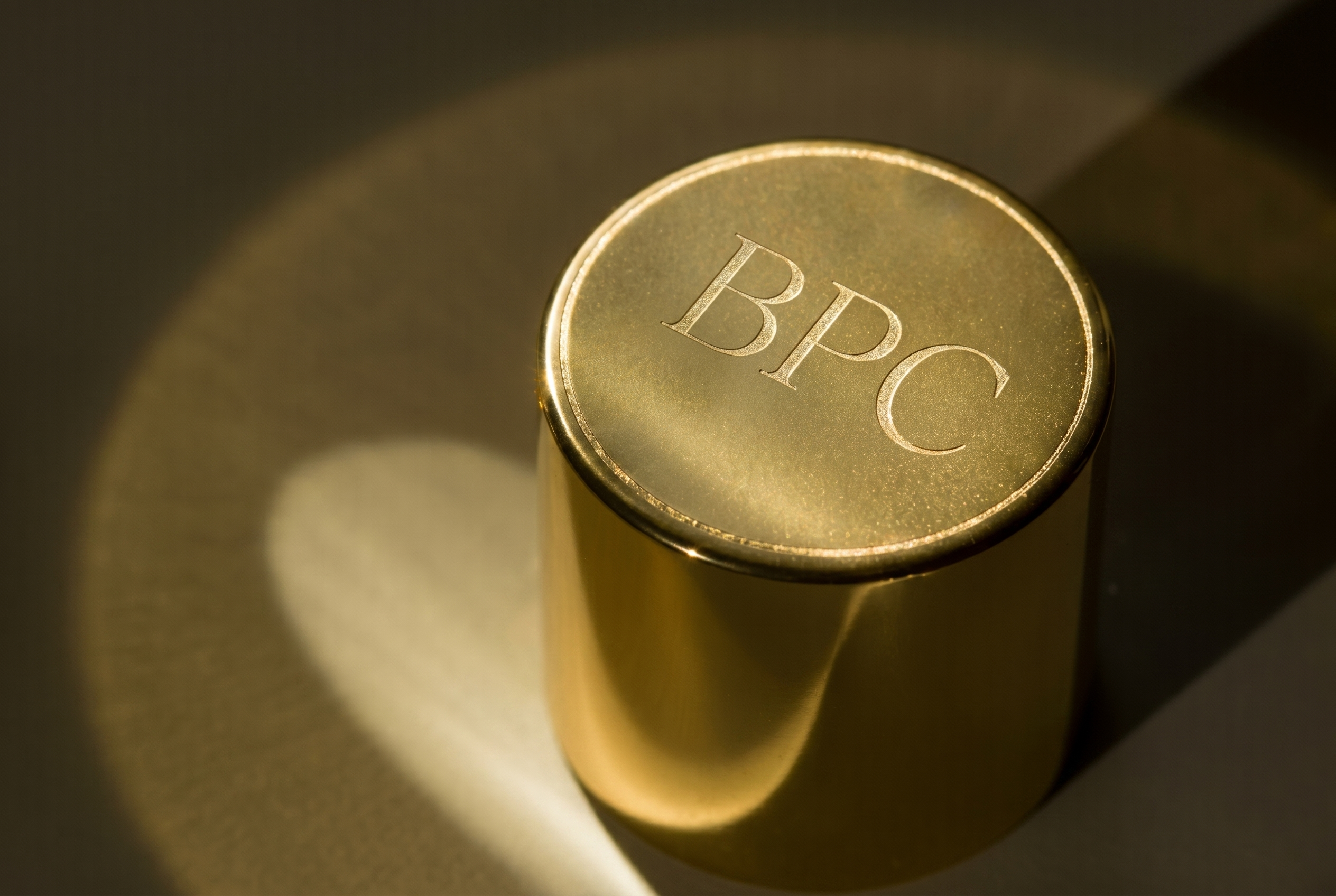 Engraved perfume bottle cap close-up — Best Perfumes & Cosmetics Industry, Sharjah UAE